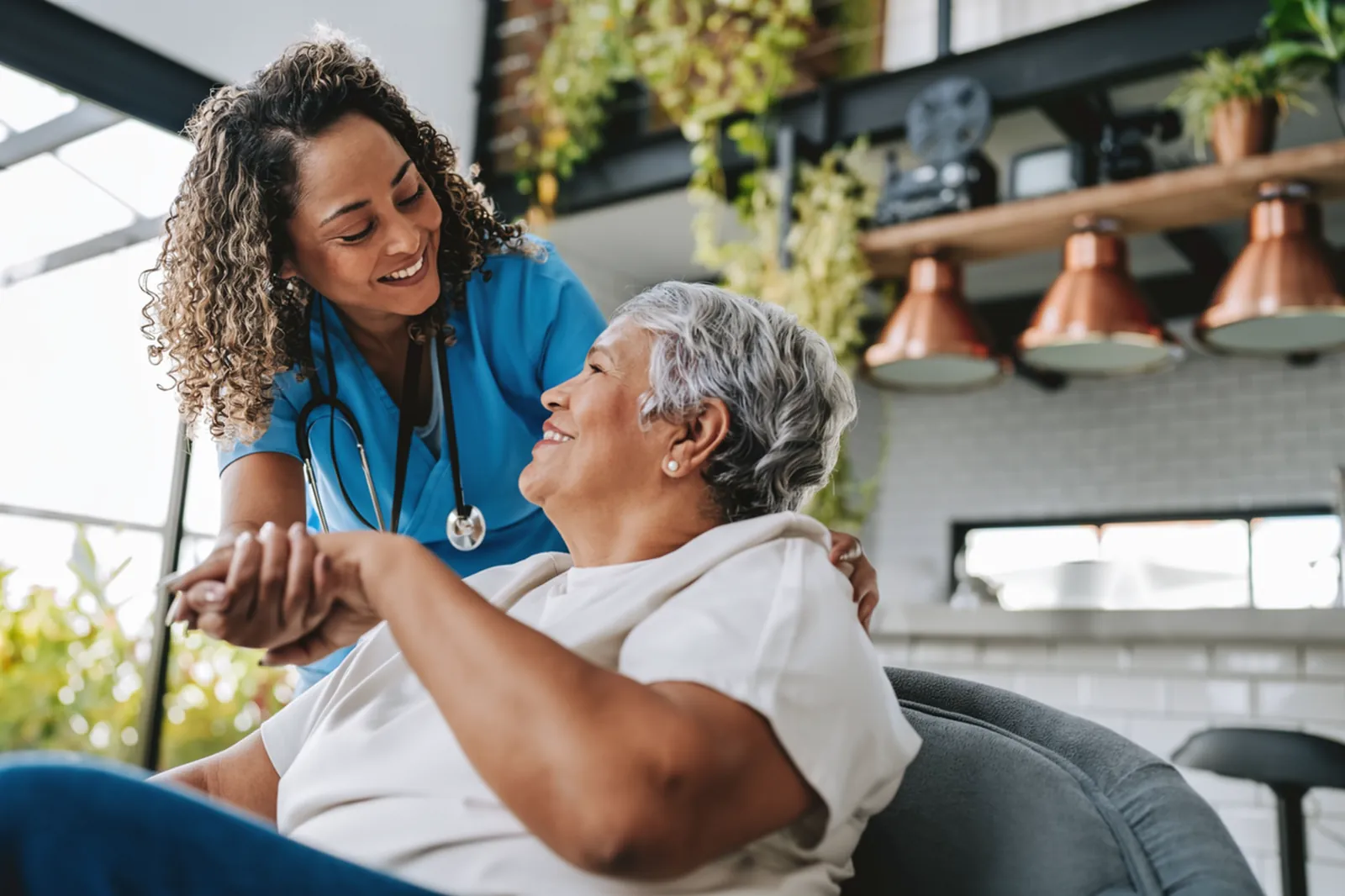 Unity Way carer supporting a client at home