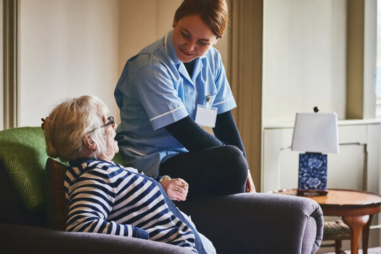 Carer and client sharing a moment of conversation