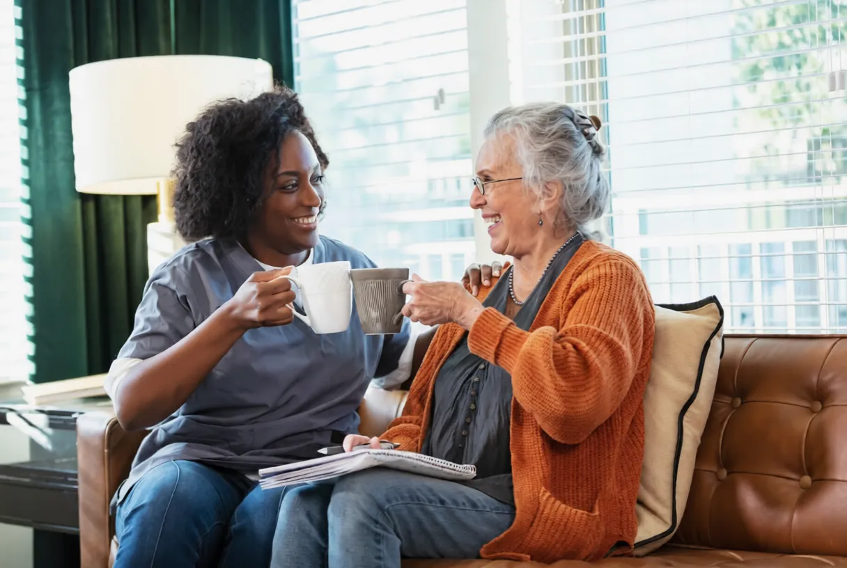 Family carer smiling alongside a client